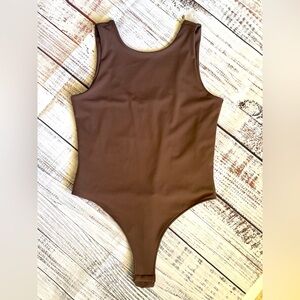 Women’s H&M brown body suit for sale - size M - new with tags on - never worn